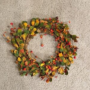 Festive Autumn Wreath with Red and Green Accents